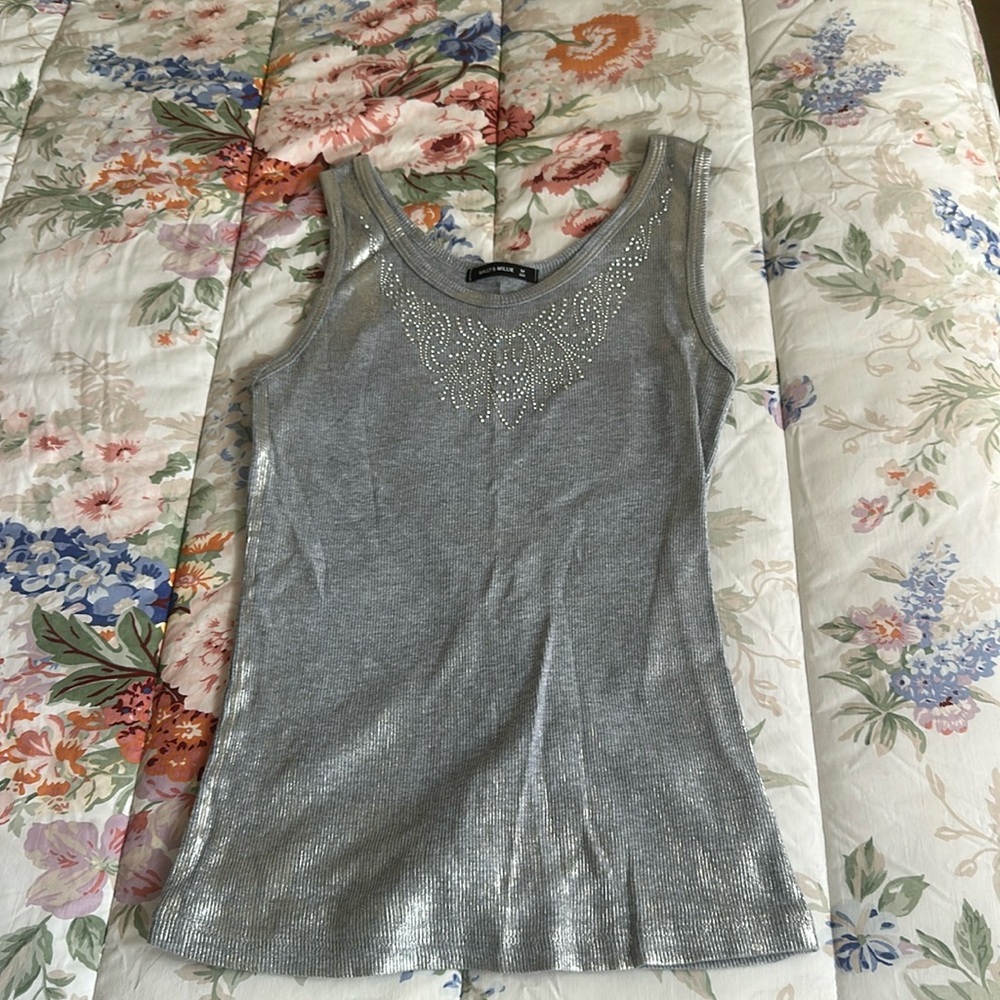 Gray tank top with decorative beaded design and a sparkly hue